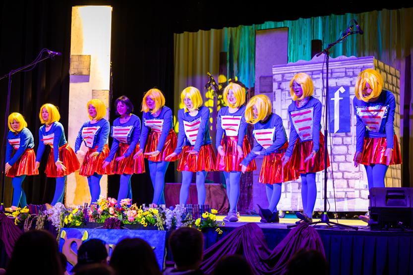 Students perform onstage